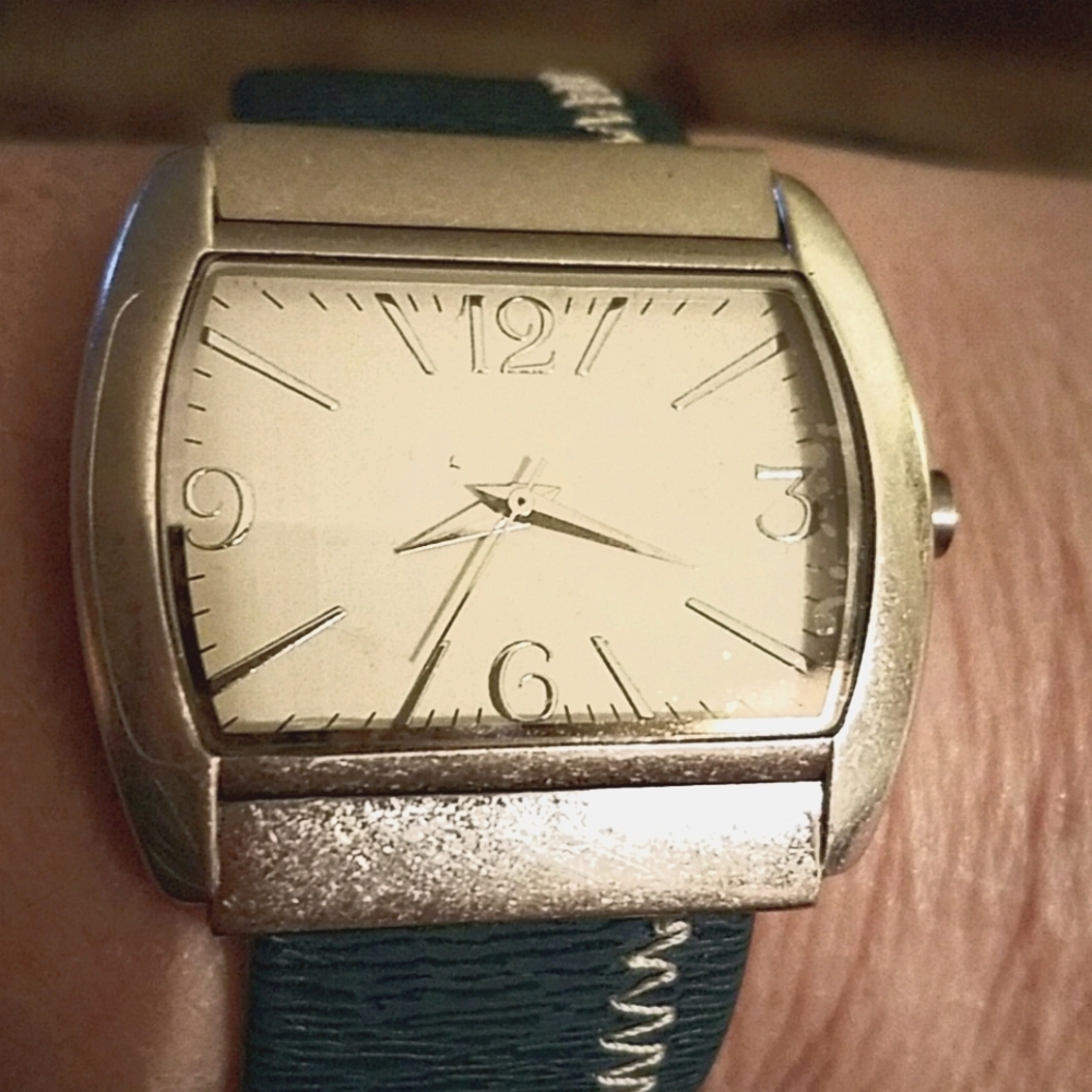 Stitched cuff watch